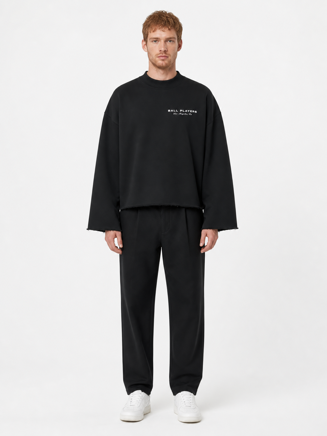 Unisex Mock Neck Raw Edge Boxy Sweatshirt front model view